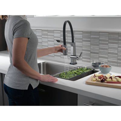 Delta Pivotal Arctic Stainless Steel Finish Single Handle Exposed Hose Kitchen Faucet with Touch2O Technology D9693TARDST