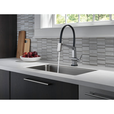 Delta Pivotal Arctic Stainless Steel Finish Single Handle Exposed Hose Kitchen Faucet with Touch2O Technology D9693TARDST