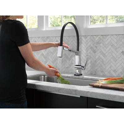 Delta Pivotal Chrome Finish Single Handle Exposed Hose Kitchen Faucet with Touch2O Technology D9693TDST