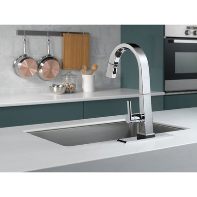 Delta Pivotal Chrome Finish Single Handle Pull Down Kitchen Faucet with Touch2O Technology D9193TDST