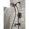 Delta Linden Collection Venetian Bronze Temp and Pressure Control Tub and Shower with 2-in-1 Hand Shower / Showerhead Includes Rough Valve without Stops D2287V