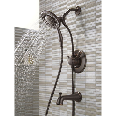 Delta Linden Collection Venetian Bronze Temp and Pressure Control Tub and Shower with 2-in-1 Hand Shower / Showerhead Includes Rough Valve with Stops D2288V