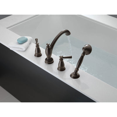 Delta Linden Collection Venetian Bronze Deck Mounted Roman Tub Filler Faucet with Hand Shower Sprayer Includes Trim Kit and Rough-in Valve D2064V